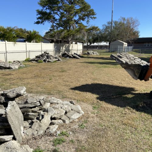 Concrete driveway removal with skid steer in Winter Haven, FL