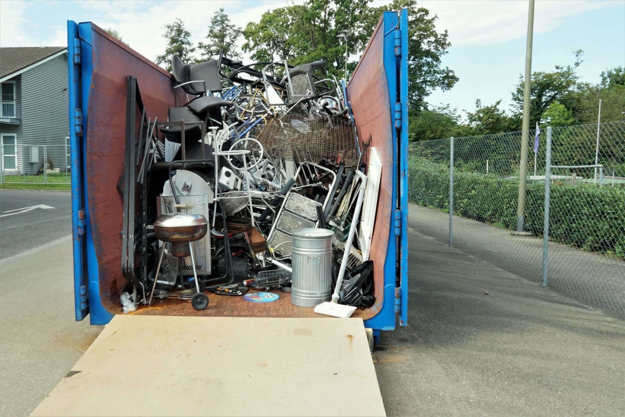 dumpster filled with debris