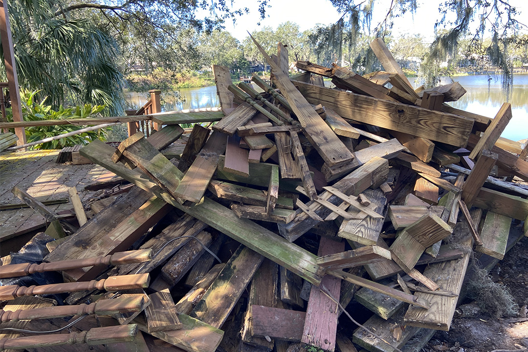 debris from deck demolition piled up in Lakeland, FL